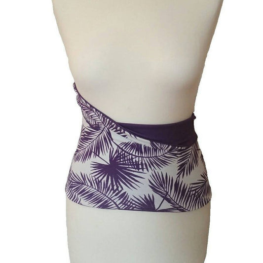 Purple leaf-patterned skirt on a mannequin against a white background