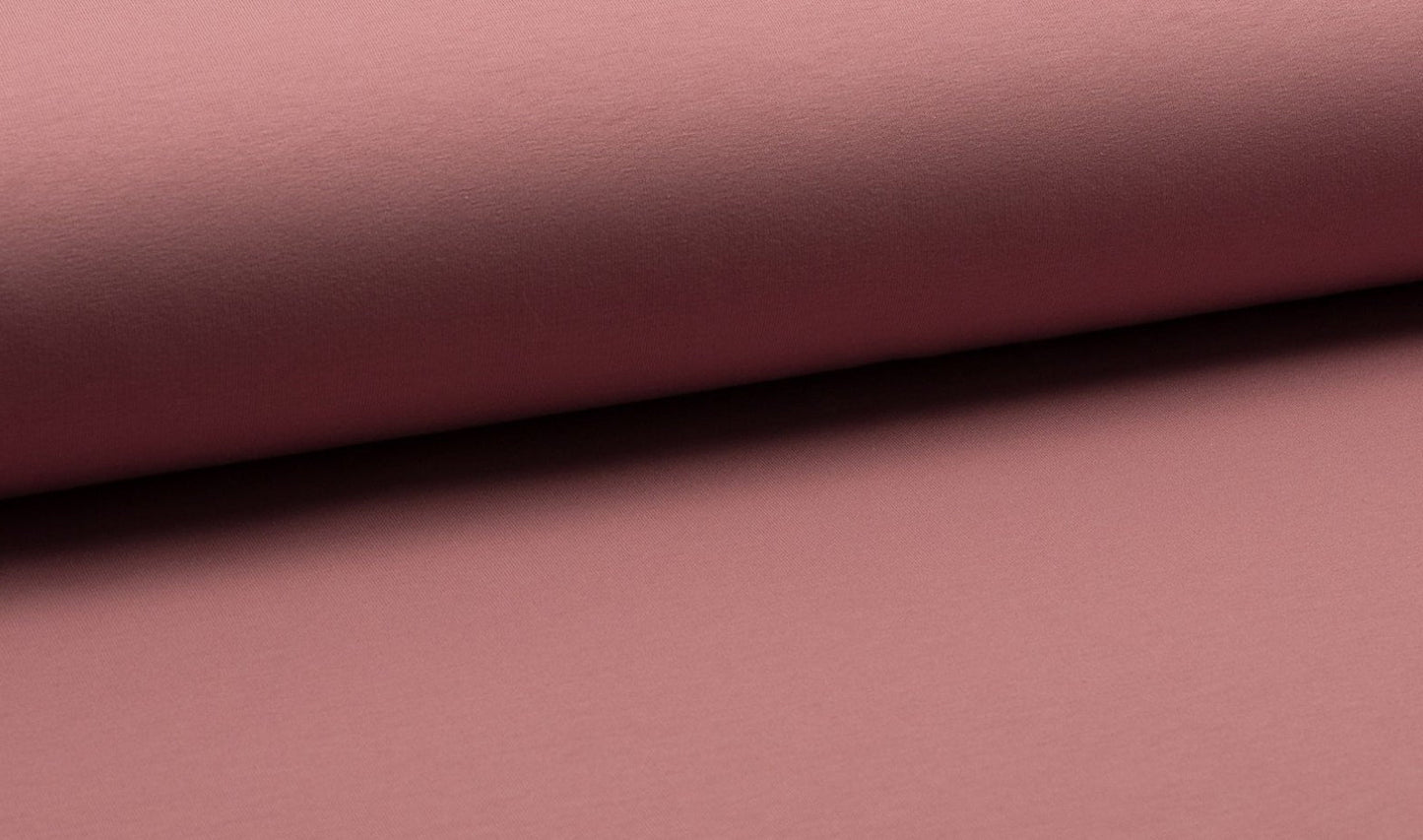 Close-up of pinkish-brown fabric texture