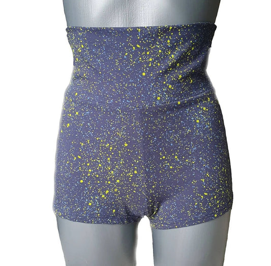 Fly and Fit blue cotton shorts with neon yellow and light blue paint splatter, high-waist to low-rise adjustable fit.