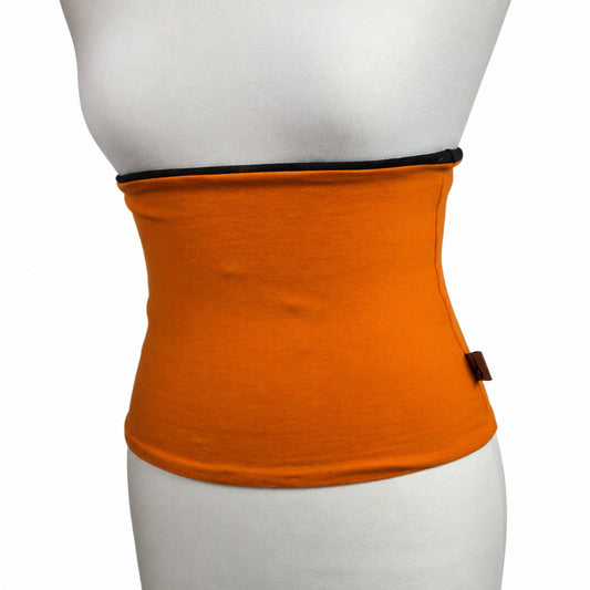 Bright orange waist trainer belt with a black inner trim, displayed on a white mannequin torso against a white background.