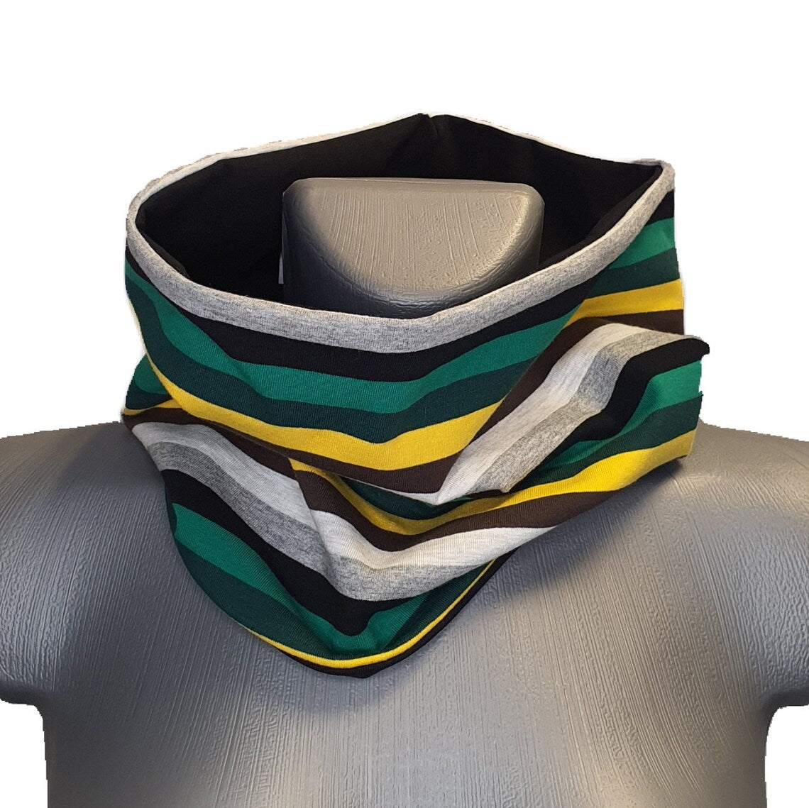 Colorful striped neck gaiter on a mannequin head with a white background