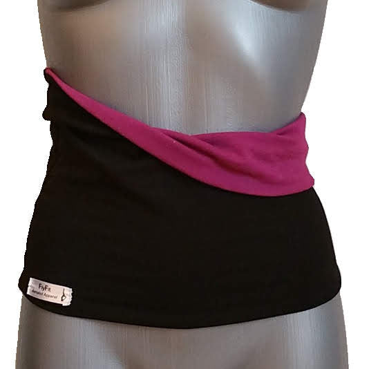 Black and pink top on a mannequin with a visible brand label.