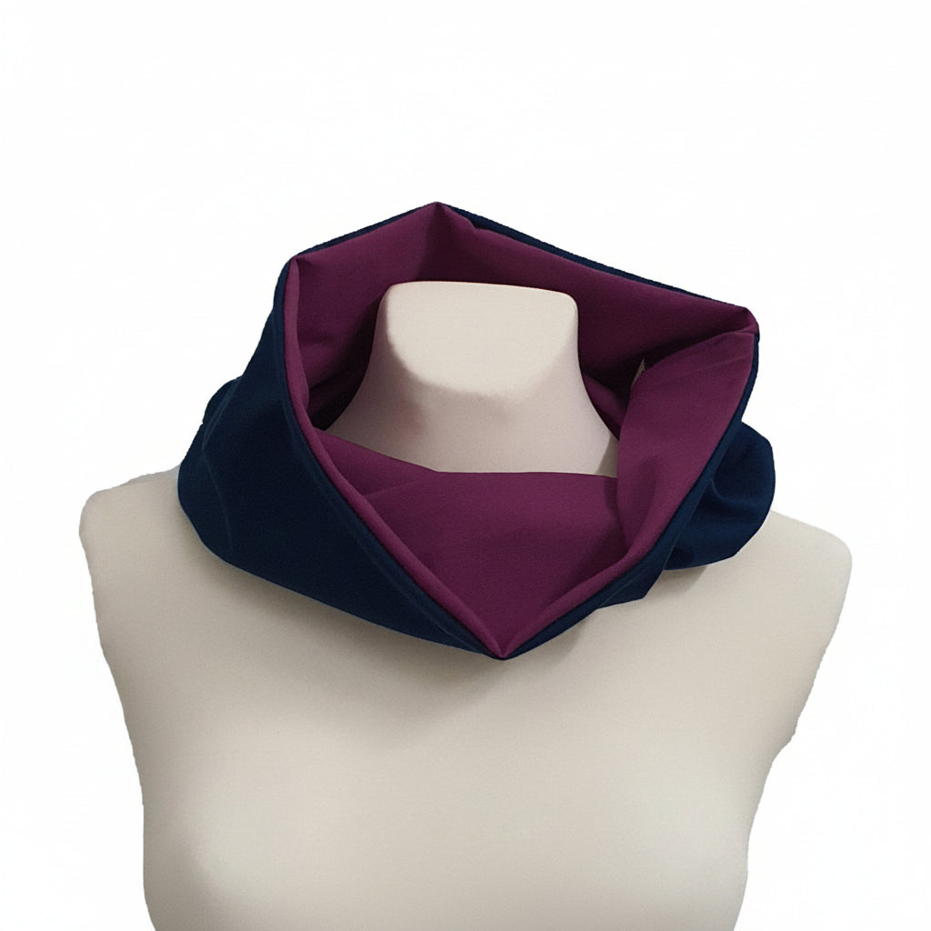 Navy and purple scarf on a mannequin with a white background
