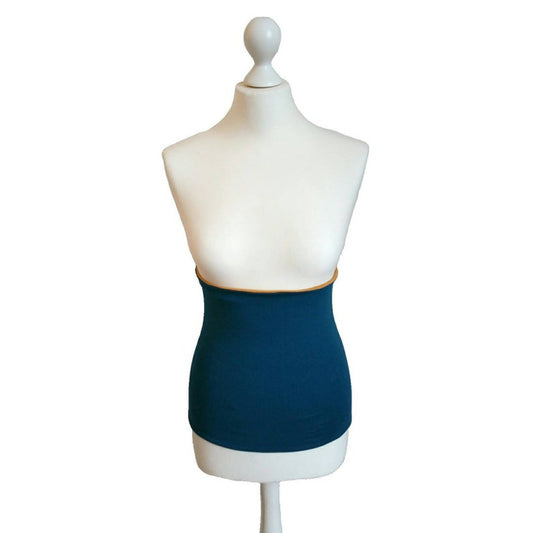 Mannequin wearing a navy blue core warmer on a white background