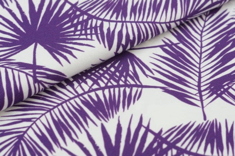 Purple palm leaf pattern on white fabric