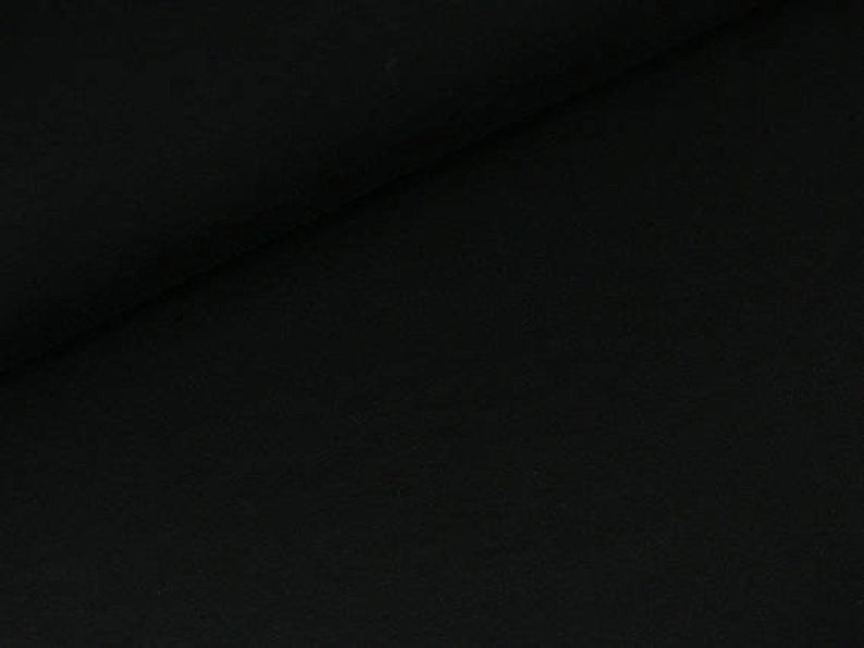 Fly and Fit black single layer cotton sweat haramaki wrap for core warmth and recovery.