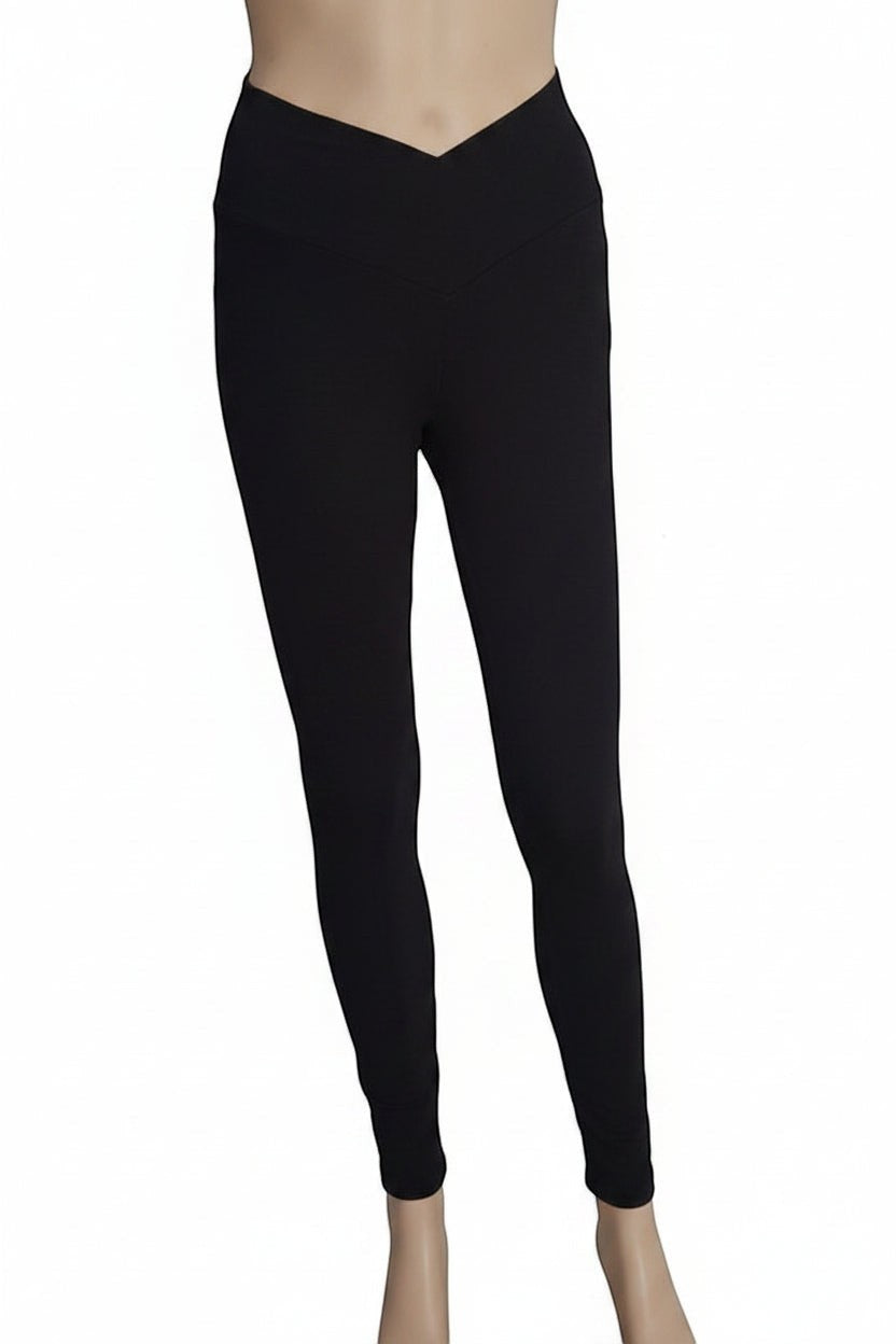 Fly and Fit black cotton leggings with a flattering high-rise V-shape waistband for yoga and movement.