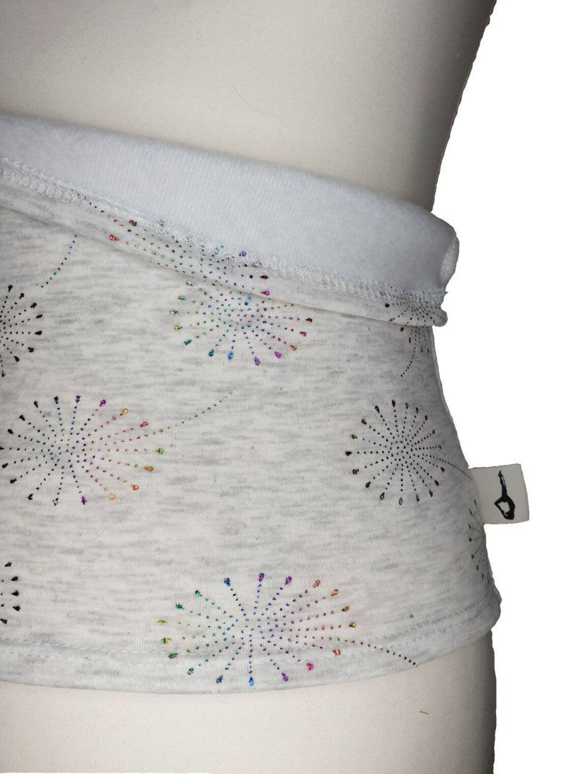 Fly and Fit Alpine fleece core warmer in light grey with a colourful dandelion print and plush white interior lining.