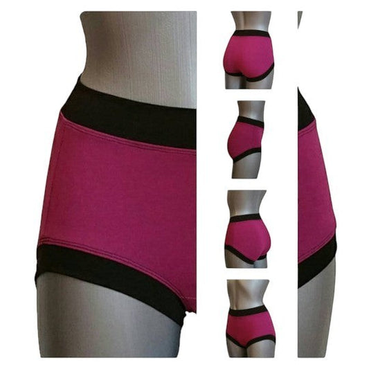 Fly and Fit Free-Flow contrast shorts in magenta cotton with black bands, worn on a mannequin for yoga or pole dance.