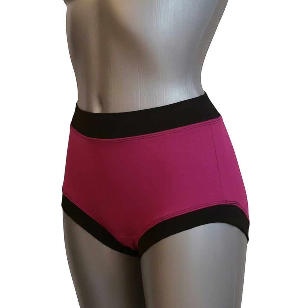 Fly and Fit magenta cotton lounge shorts with black contrast bands on a mannequin, elastic-free design.