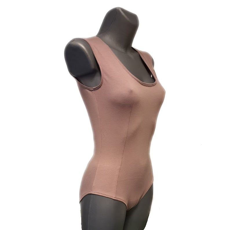 Fly and Fit mauve cotton princess-cut leotard on a mannequin, showing vertical seams for a flattering dance fit.