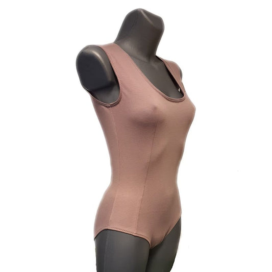 Fly and Fit mauve cotton princess-cut leotard on a mannequin, showing vertical seams for a flattering dance fit.