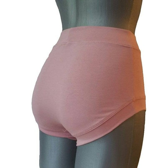 Fly and Fit powder pink cotton blend move shorts with a seamless, no-dig waistband and leg openings.