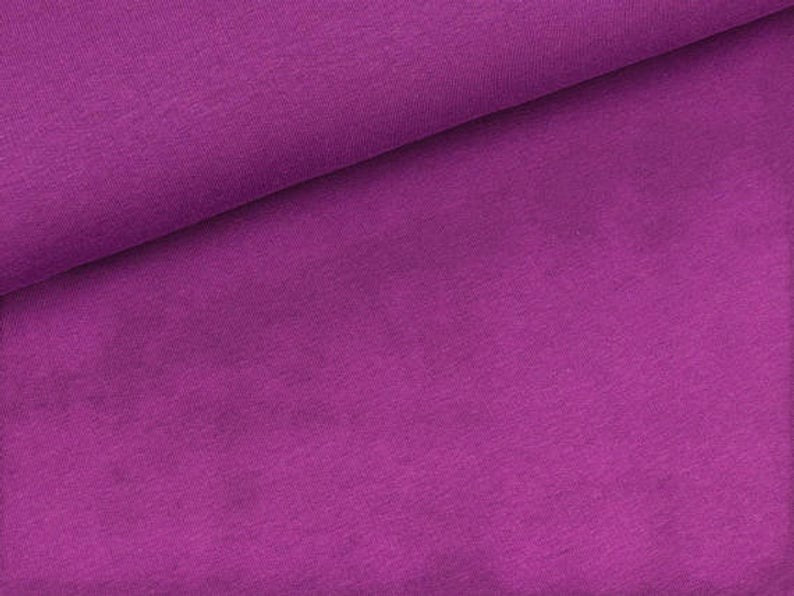 Fly and Fit purple cotton sweat haramaki wrap for core warmth and recovery. Single layer, lightweight.