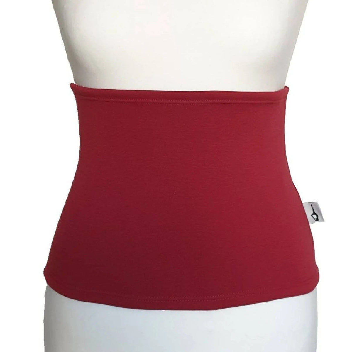 Fly and Fit red Alpine fleece core warmer worn on a mannequin for thermal protection during aerial training.