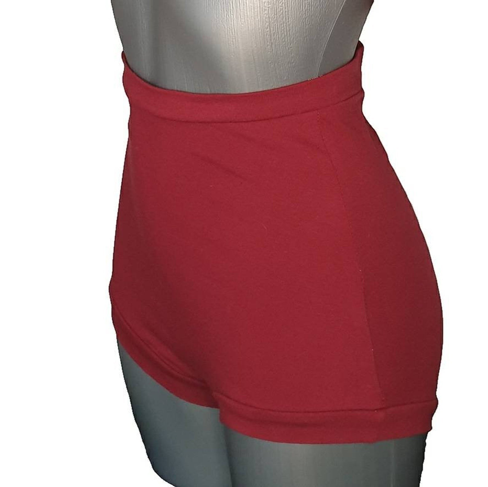 Fly and Fit high-waist red cotton studio shorts with a vintage cut for aerialists and dancers on a mannequin