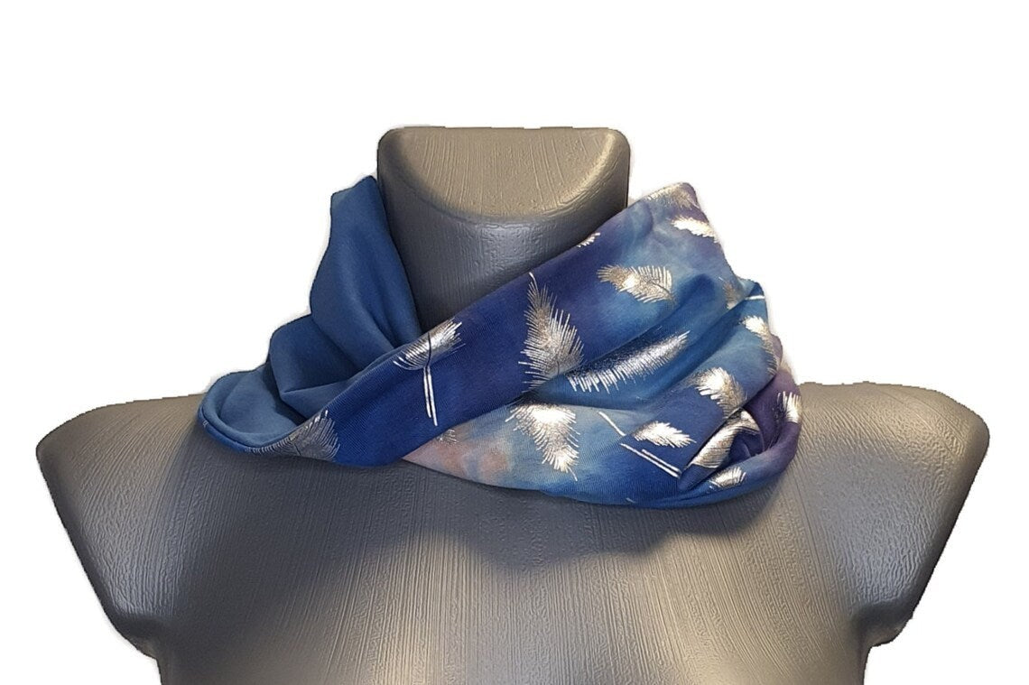 Fly and Fit reversible cotton jersey haramaki back warmer featuring blue tie-dye with silver feather print.