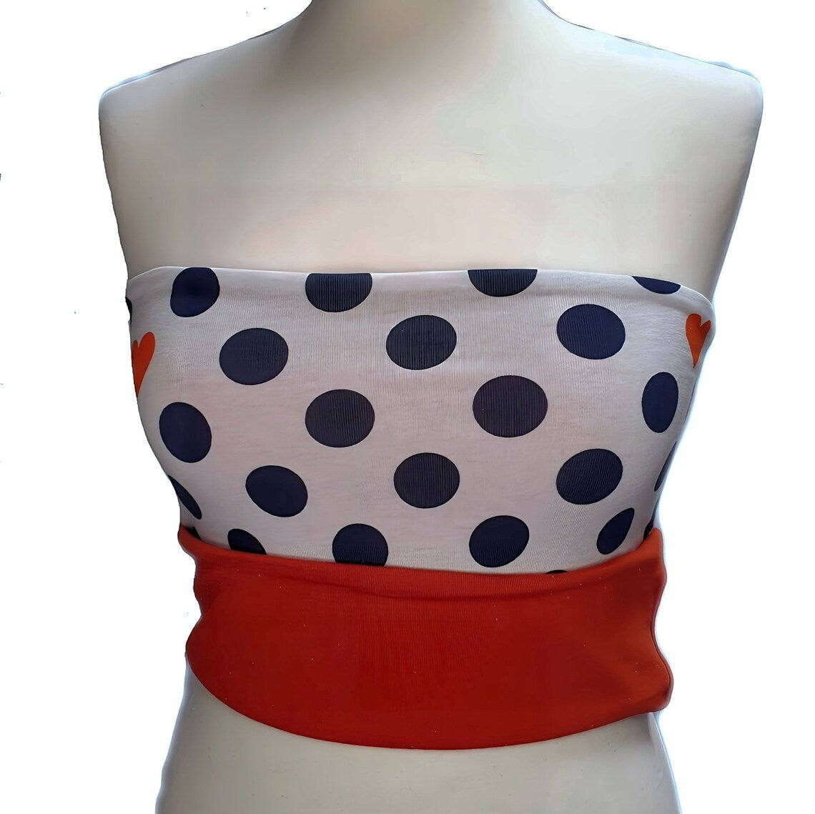 Fly and Fit reversible cotton jersey back warmer featuring a white polka dot and heart print with a solid red band