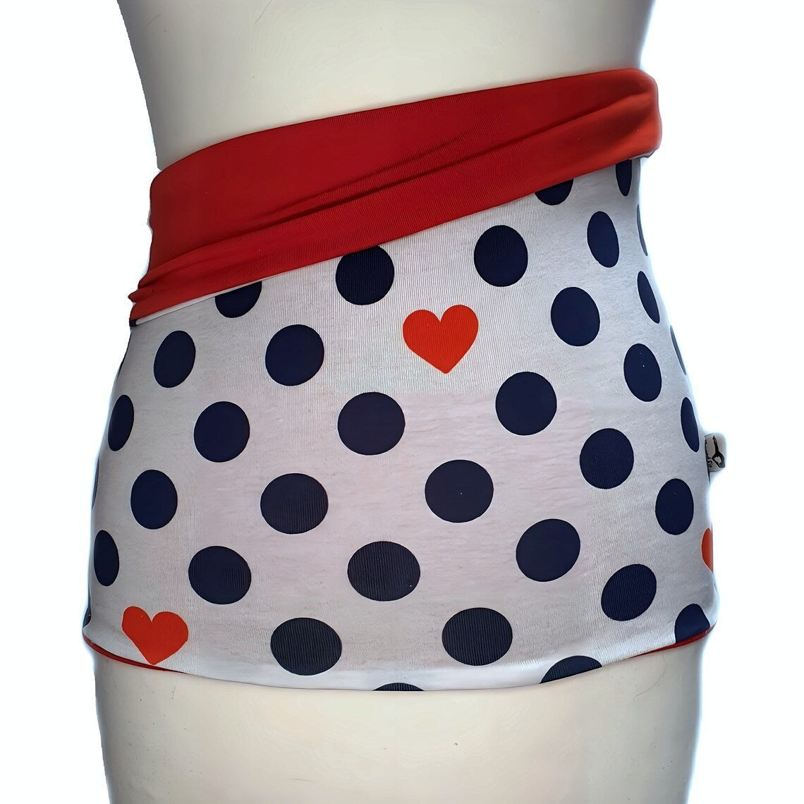 Fly and Fit reversible cotton jersey back warmer with white polka dot and red heart print on one side and solid red