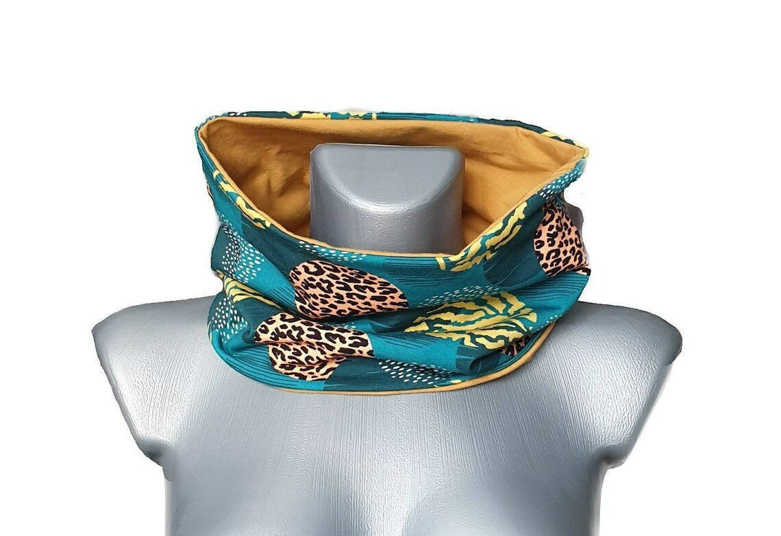 Fly and Fit reversible core warmer in petrol teal floral leopard print and mustard yellow cotton jersey blend