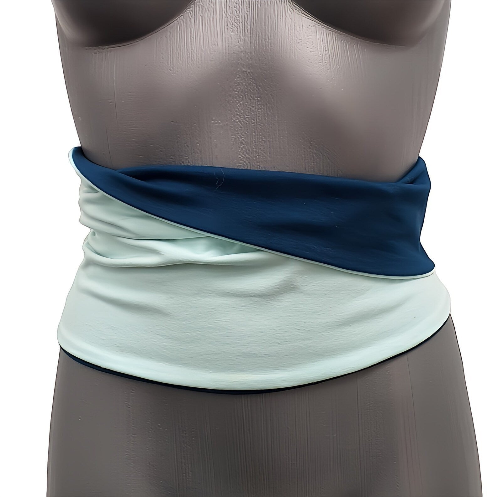 Fly and Fit reversible cotton jersey haramaki core warmer in mint and deep petrol blue on a mannequin torso.