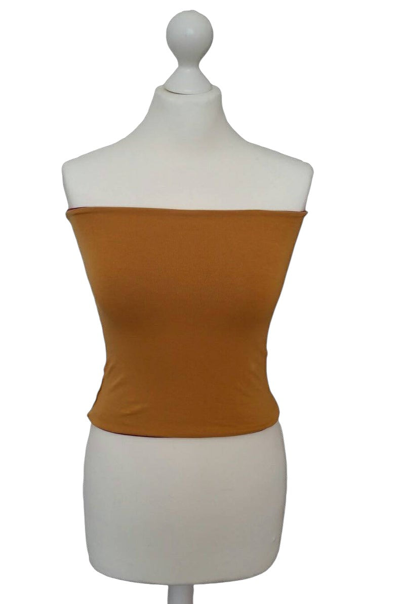 Fly and Fit reversible mustard yellow and bordeaux cotton jersey core warmer on a mannequin