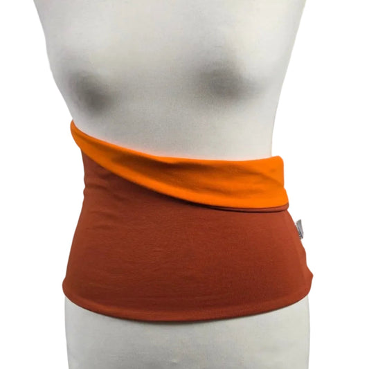 Fly and Fit reversible cotton jersey core warmer in bright orange and muted rust for aerial and studio training.