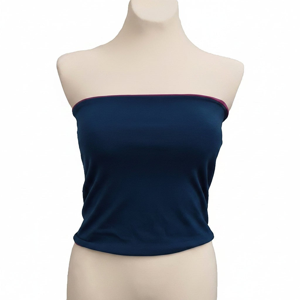 Fly and Fit reversible petrol and lilac haramaki core warmer on a mannequin for aerial and ballet training.
