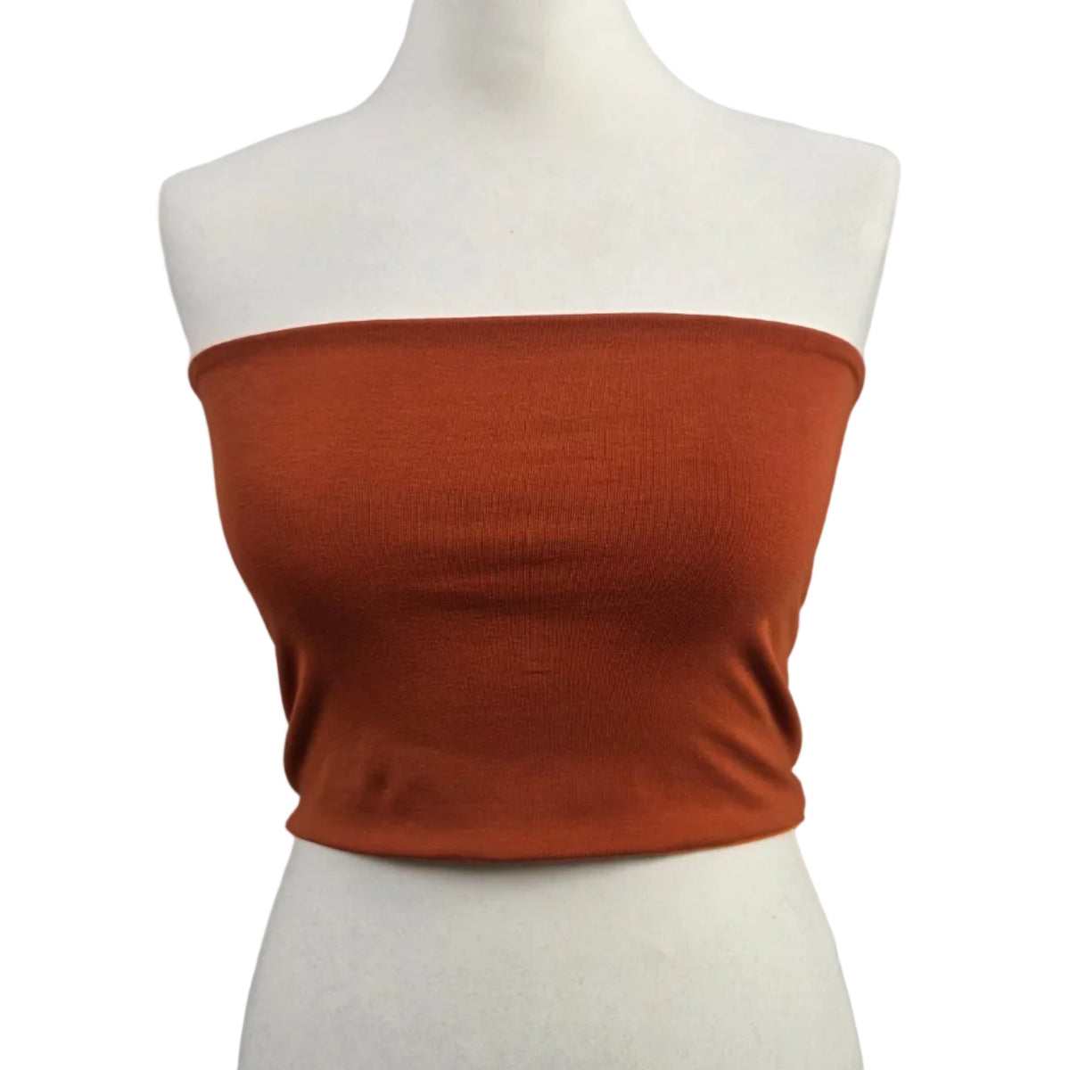 Fly and Fit reversible cotton jersey core warmer in muted rust orange on a mannequin for aerial and studio training.