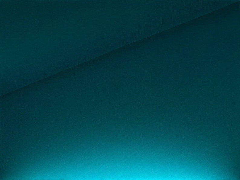 Fly and Fit teal cotton sweat fabric swatch for a bespoke double-layered core warmer