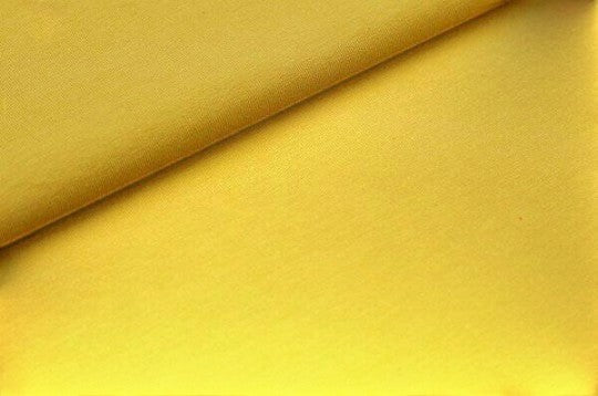 Fly and Fit yellow cotton fabric swatch for Free-Flow contrast shorts, showing soft texture and vibrant colour